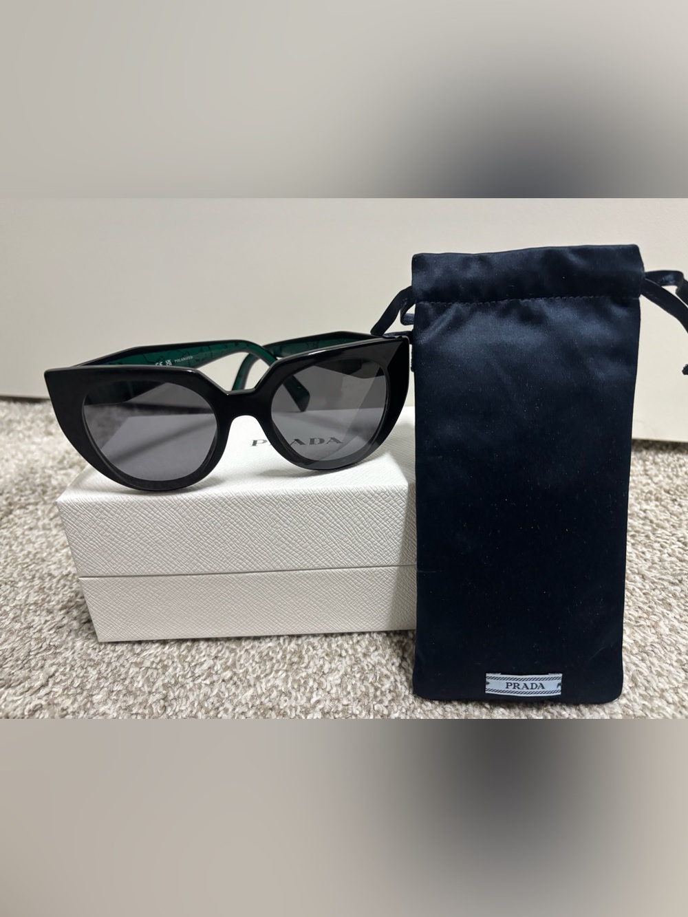 Prada Black Cat-Eye Sunglasses with Dark Gray Lenses